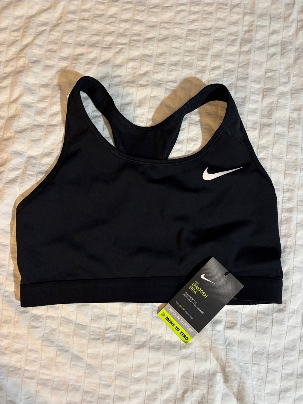 NWT. Nike Swoosh Black Racerback Sport Bra with White Swoosh Sz L Medium Support